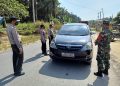 Sebagai Langkah Penanggulangan Covid-19, Kapolsek Kerumutan Awasi Ketat Penerapan Prokes