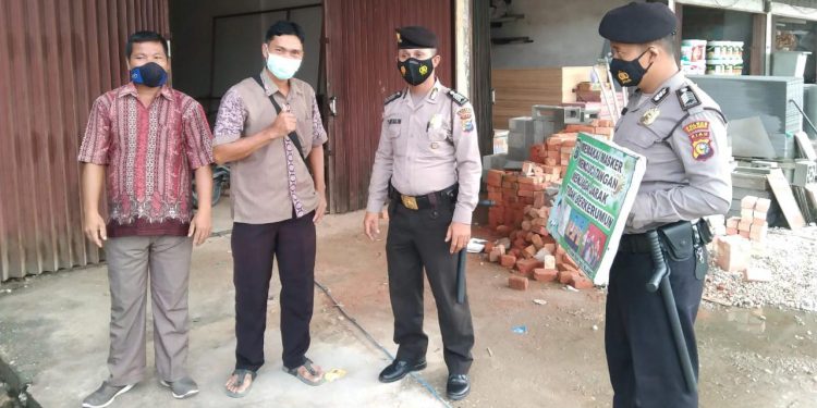 Minimalisir Penularan Covid-19, Polsek Bandar Sei Kijang Terus Imbau Masyarakat Terapkan Prokes