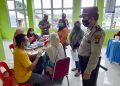 Polsek Kuala Kampar Amankan Giat Vaksinasi di Puskesmas