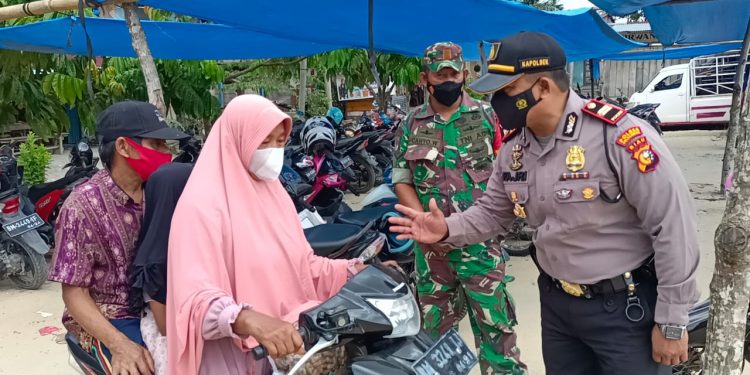 Kapolsek Kerumutan Kerahkan Personil Lakukan Operasi Yustisi