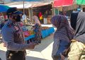 Cegah Gangguan Kamtibmas, Polsek Kerumutan Patroli di Pasar Tradisional