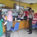 Personil Polsek Teluk Meranti Kawal Vaksinasi di Desa Binaanya
