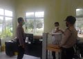 Personil Polsek Kerumutan Kawal Vaksinasi di Gerai Vaksin Presisi